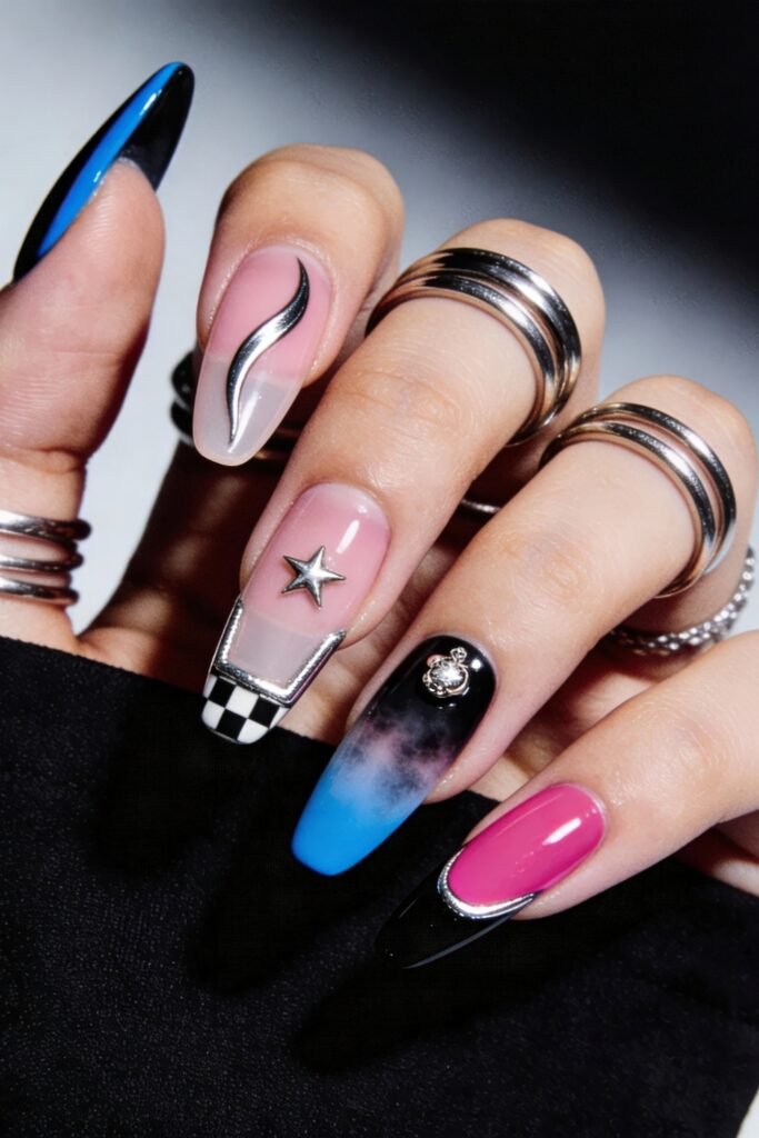 Artistic Nail Art Ideas combining checkerboard patterns, ombré blues, pink chrome accents, and metallic embellishments for a dynamic and high-contrast look.