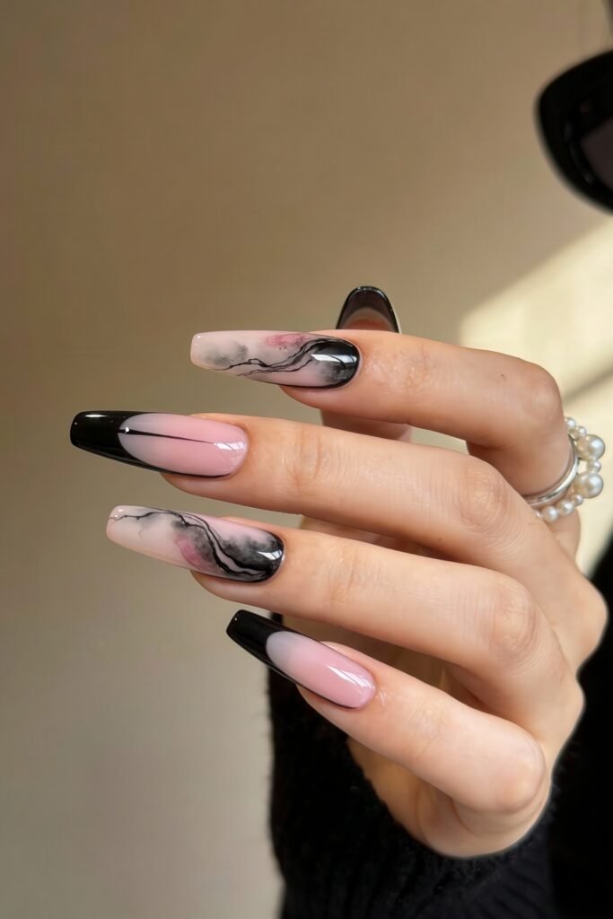 Black And Pink Nails That Look Instantly Chic 23 Long square nails combining soft pink and black in a marbled swirl pattern, accented with subtle touches of pink and finished with high-gloss shine.