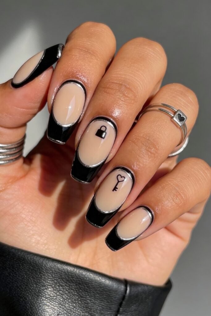 Black Valentines Day Nails That Feel Chic And Romantic 6 Glossy square-shaped nails with a nude base and bold black french tips, including a lock and heart-shaped key design for a playful black valentines day nails concept.