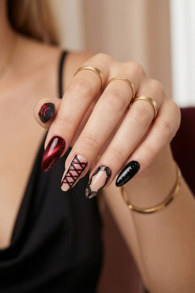 Black and Red Nails for a Bold, Polished Look 8 Hand with gold rings showing gothic almond nails in black and deep red featuring corset lacing lace details and glossy accents